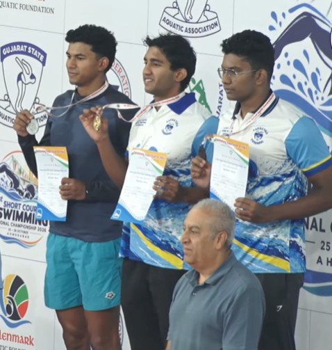 Men's 100m breaststroke podium, Day 2