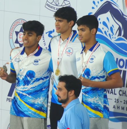 Men's 200m backstroke podium, Day 4